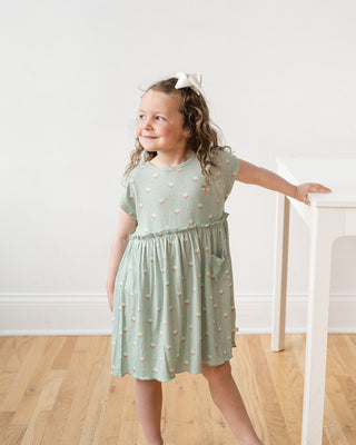 Girl wearing dress with flower print