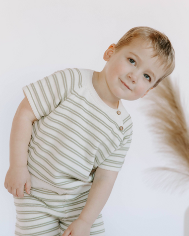 Little boy wearing organic cotton knit stripe short set in sage