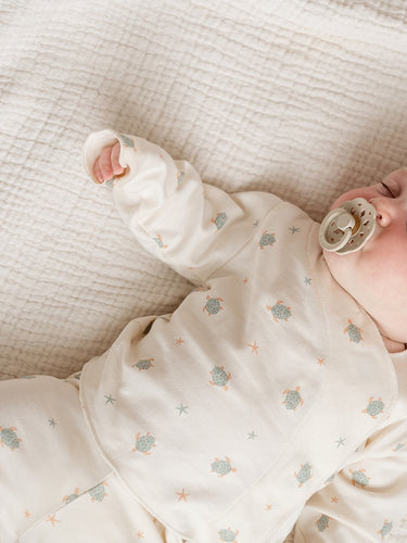 Baby Sleeping in Turtle Pajamas