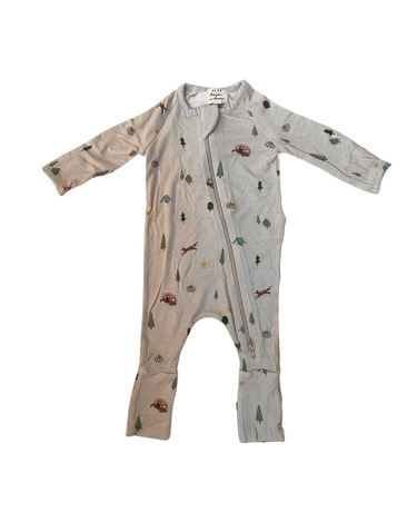 image shows flat lay of modal convertible footy pajamas in camping print