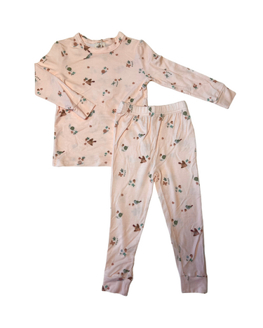 Flat lay image of modal pajama set in birds print.