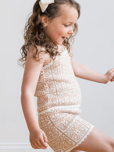 Hayden wearing seashell knit set for summer