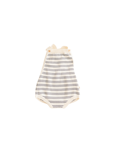 Image shows organic cotton knit bubble romper in midnight stripes with adjustable shoulder straps and magnetic closures at the crotch for easy changing.