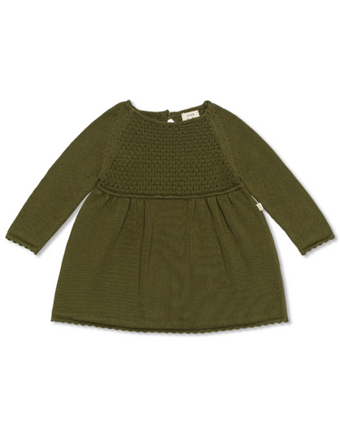 Image Flat lay image of knit dress in crocodile color with sweet details and button detail at the back of the neck.