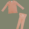 Flat lay image of organic cotton rib two piece set in strawberries and cream color. Set includes a long sleeve top with Magnetic Buttons at the neck in sizes through 12-18 months as well as leggings with a faux drawstring.