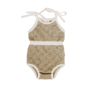 Picture of organic cotton knit bubble romper in truffle color with tie strings at shoulders and hidden magnetic closures at crotch for easy changing.