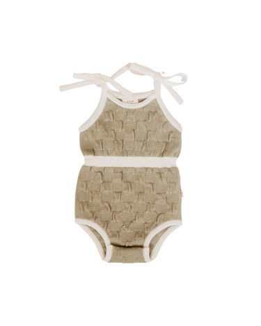 Picture of organic cotton knit bubble romper in truffle color with tie strings at shoulders and hidden magnetic closures at crotch for easy changing.