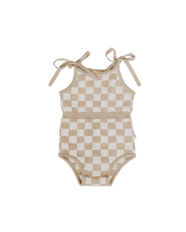 Picture of organic cotton knit bubble romper with tie strings at shoulders and hidden magnetic closures at crotch for easy changing in beige checkers color.