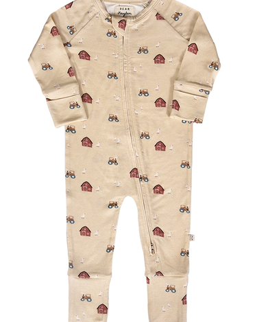 flat lay image of modal convertible footy pajamas in light beige color with farm print