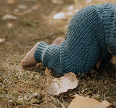 baby boy wearing organic cotton chunky knit set in blue stone dear hayden