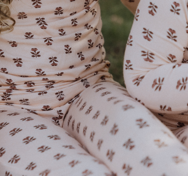 toddler girl wearing modal pajama set in light pink color with rose floral pattern