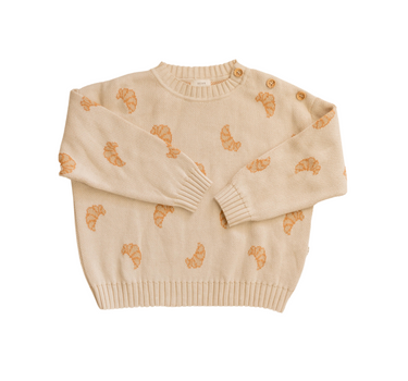 Organic Cotton knit sweater with croissant pattern and Magnetic Buttons at shoulder.