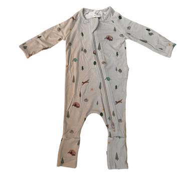 image shows flat lay of modal convertible footy pajamas in camping print