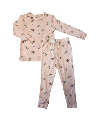 Flat lay image of modal pajama set in birds print. 