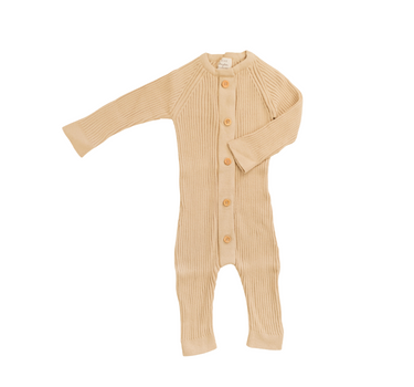 Image shows organic cotton rib knit romper in sandcastle with Magnetic Buttons from neck to crotch for easy changing.