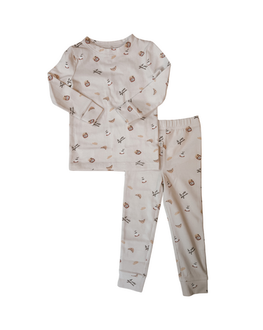 Flat lay image on white background of modal pajama set in Petit Déjeuner print with coffee mugs, croissants, butter, and jam.