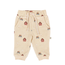 flat lay image of organic cotton fleece joggers in farm print with light beige color