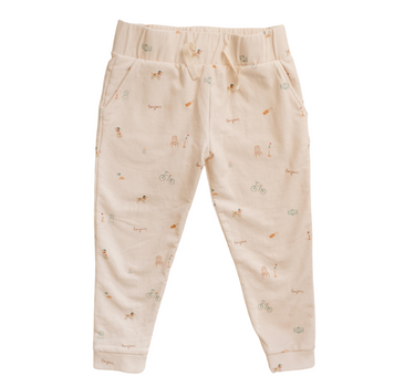 Photo shows organic cotton italian fleece joggers in Paris print with pockets and faux drawstring.