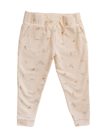 Photo shows organic cotton italian fleece joggers in Paris print with pockets and faux drawstring.